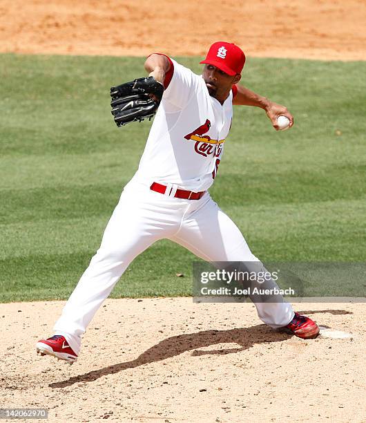 Romero of the St. Louis Cardinals throws the ball against the Detroit Tigers during a Grapefruit League spring training game at Roger Dean Stadium on...