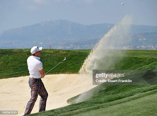 Jamie Donaldson of Wales plays a bunker shot during the first round of the Sicilian Open at Verdura Golf and Spa Resort on March 29, 2012 in Sciacca,...