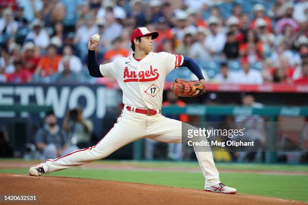 Shohei Ohtani of the Los Angeles Angels pitches against the Houston Astros in the first inning at Angel Stadium of Anaheim on September 03, 2022 in...