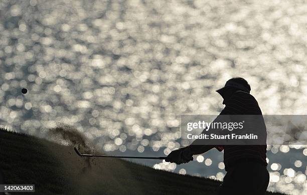 Phillip Price of Wales plays a bunker shot during the first round of the Sicilian Open at Verdura Golf and Spa Resort on March 29, 2012 in Sciacca,...