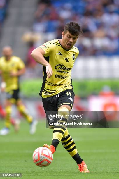 Jorge Meré of Mazatlán drives the ball during the 12th round match between Monterrey and Mazatlan FC as part of the Torneo Apertura 2022 Liga MX at...