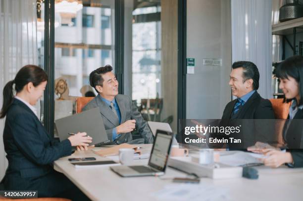 asian businessmen cheerful discussion in meeting room - work gender equality stock pictures, royalty-free photos & images