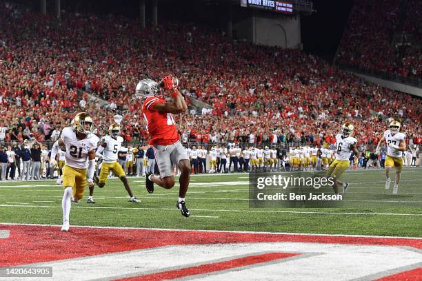 Xavier Johnson of the Ohio State Buckeyes catches a touchdown pass during the third quarter of a game against the Notre Dame Fighting Irish at Ohio...