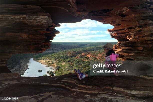 australian girl looking at the view from nature's window kalbarri national park western australia - national girl child day stock pictures, royalty-free photos & images