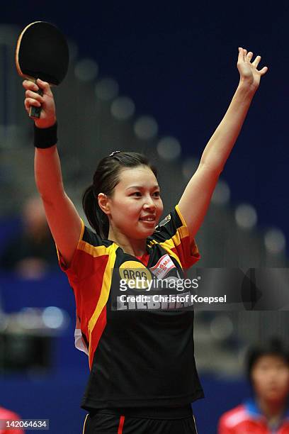 Wu Jiaduo of Germany celebrates her victory against Kim Hye Song of North Korea during the LIEBHERR table tennis team world cup 2012 championship...