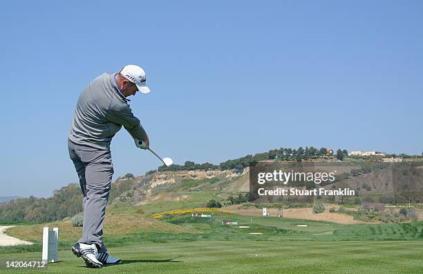 Alastair Forsyth of Scotland plays a shot during the first round of the Sicilian Open at Verdura Golf and Spa Resort on March 29, 2012 in Sciacca,...