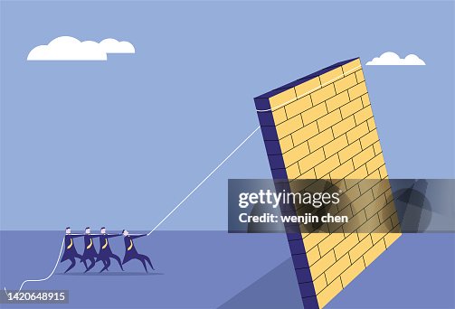 People pull the wall down with ropes People pull the wall down with ropes