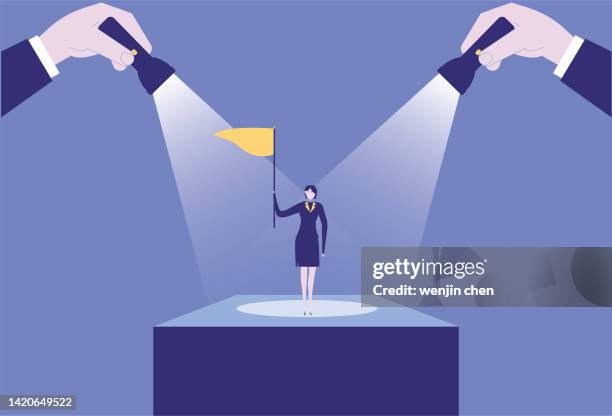 two flashlights illuminate female white collar holding flag on podium - employee spotlight stock illustrations