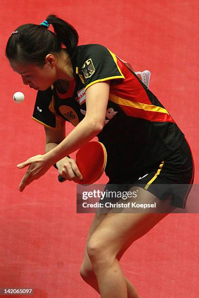 Wu Jiaduo of Germany serves during her match against Kim Hye Song of North Korea during the LIEBHERR table tennis team world cup 2012 championship...