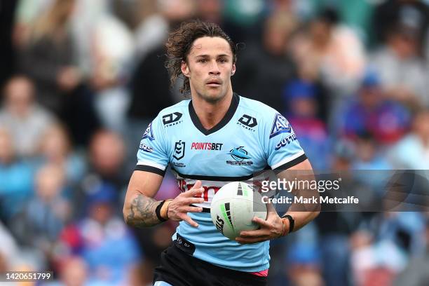 Nicho Hynes of the Sharks in action during the round 25 NRL match between the Newcastle Knights and the Cronulla Sharks at McDonald Jones Stadium, on...
