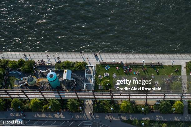 In this aerial view people visit Domino Park during Labor Day Weekend in Williamsburg on September 03, 2022 in the Brooklyn Borough of New York City....