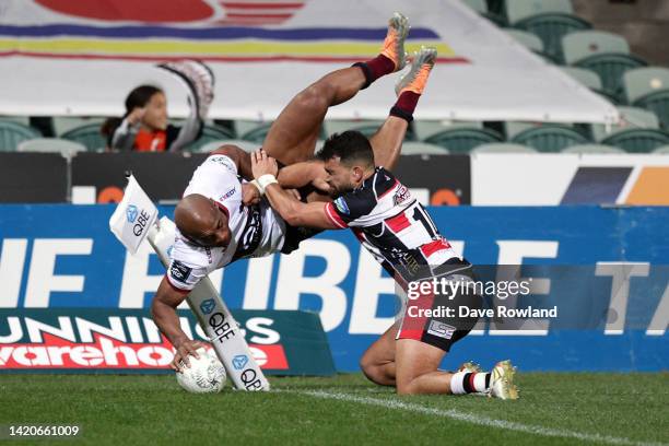 Mark Telea of North Harbour beats Riley Hohepa of Counties to score a try during the round 5 Bunnings NPC match between North Harbour and Counties...