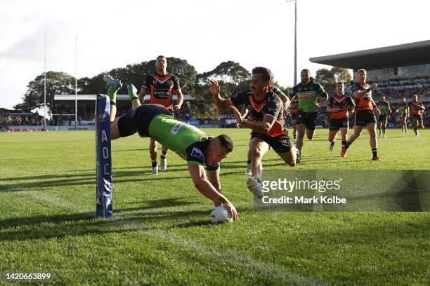 Nick Cotric of the Raiders scores try during the round 25 NRL match between the Wests Tigers and the Canberra Raiders at Leichhardt Oval, on...