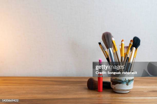 makeup brush and decorative cosmetics - kit stock pictures, royalty-free photos & images