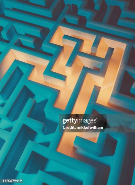 drone view of woman trapped inside a maze while trying to get out - escaping maze stock pictures, royalty-free photos & images