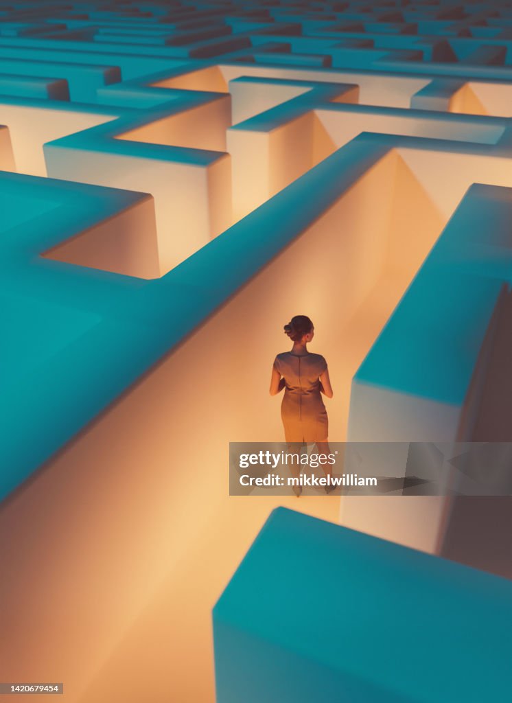 Trapped in a maze a woman is looking for a way to get out