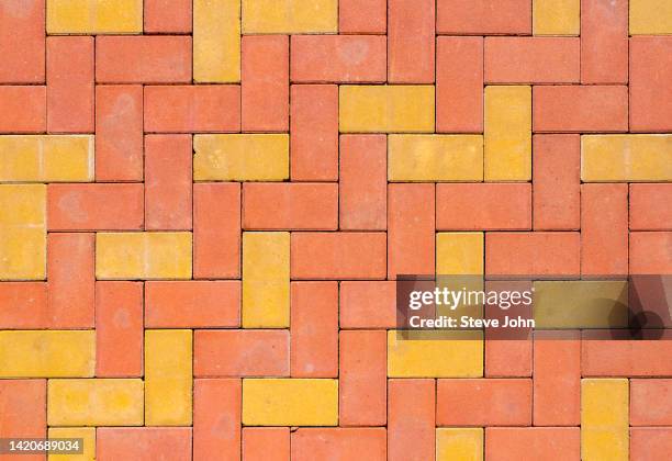 paving stong road - brick pathway stock pictures, royalty-free photos & images