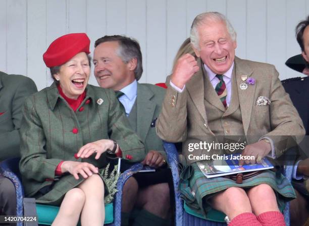 Anne, Princess Royal and Prince Charles, Prince of Wales, known as the Duke of Rothesay when in Scotland laughing during the Braemar Highland...