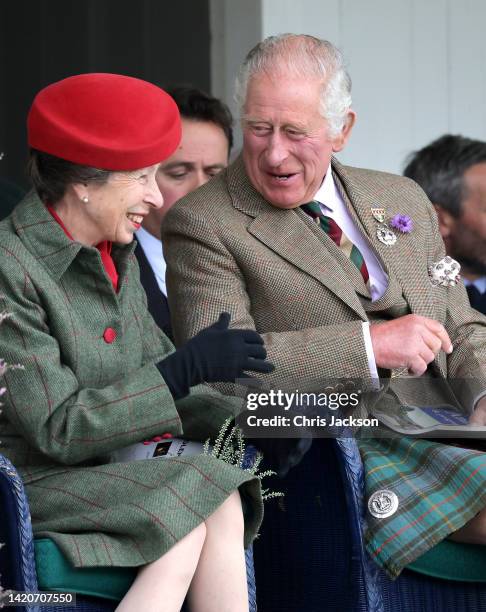 Anne, Princess Royal and Prince Charles, Prince of Wales, known as the Duke of Rothesay when in Scotland laughing during the Braemar Highland...