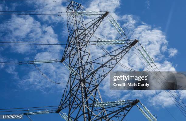 August 15: Pylons take electrical power from Hinkley Point B nuclear power station on August 15, 2022 in Bridgwater, England. Nearby, the first new...