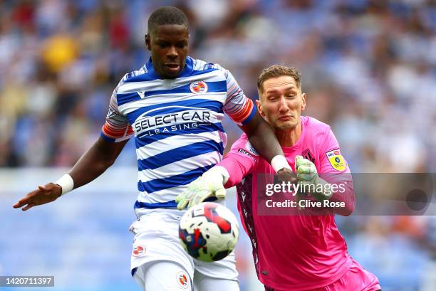 Lucas Joao of Reading scores their sides first goal past Jack Bonham of Stoke City during the Sky Bet Championship match between Reading and Stoke...