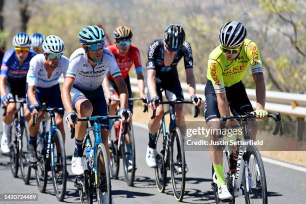 Vincenzo Nibali of Italy and Team Astana – Qazaqstan and Elie Gesbert of France and Team Arkéa - Samsic compete in the breakaway during the 77th Tour...