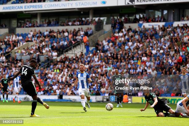 Kelechi Iheanacho of Leicester City scores their sides first goal during the Premier League match between Brighton & Hove Albion and Leicester City...