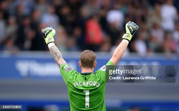 Jordon Pickford of Everton celebrates to the crowd during the Premier League match between Everton FC and Liverpool FC at Goodison Park on September...