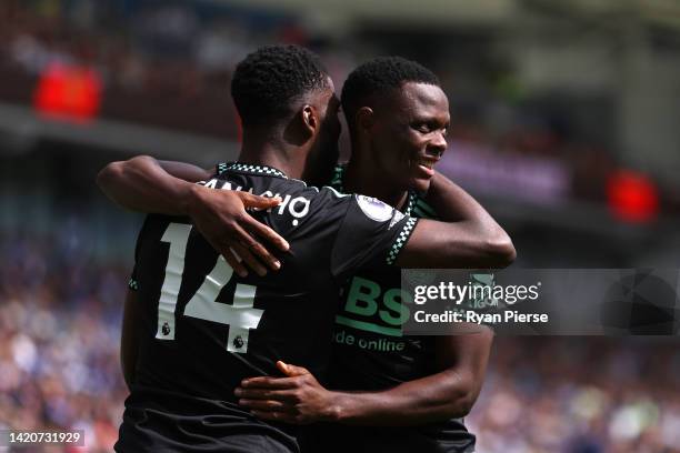 Kelechi Iheanacho of Leicester City celebrates with Patson Daka after scoring their sides first goal during the Premier League match between Brighton...