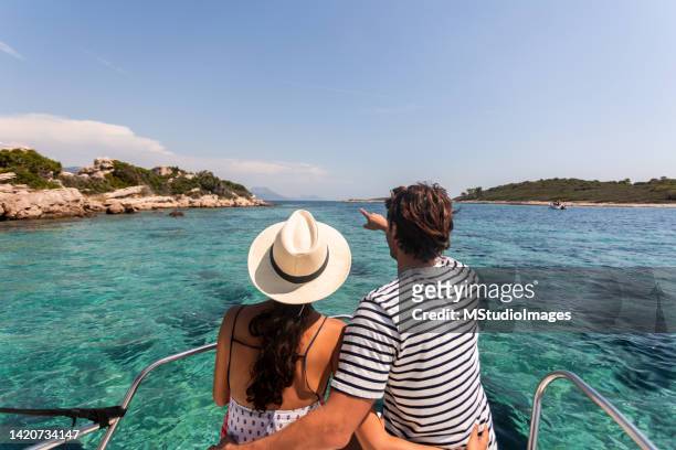 couple enjoying the sunny day at the deck - croatia coast imagens e fotografias de stock