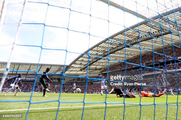 Kelechi Iheanacho of Leicester City scores their sides first goal during the Premier League match between Brighton & Hove Albion and Leicester City...