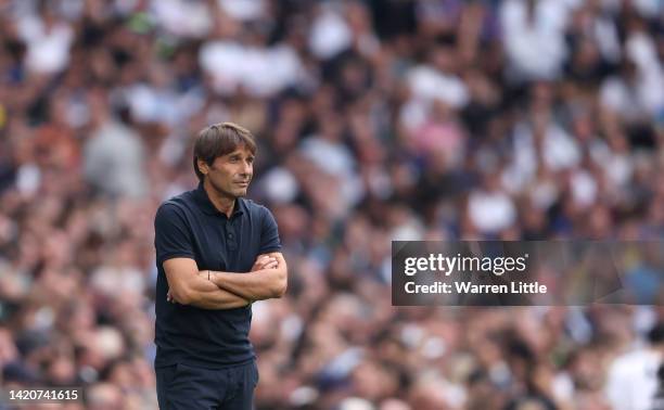 Antonio Conte, Head Coach of Tottenham Hotspur looks on from the side line during the Premier League match between Tottenham Hotspur and Fulham FC at...