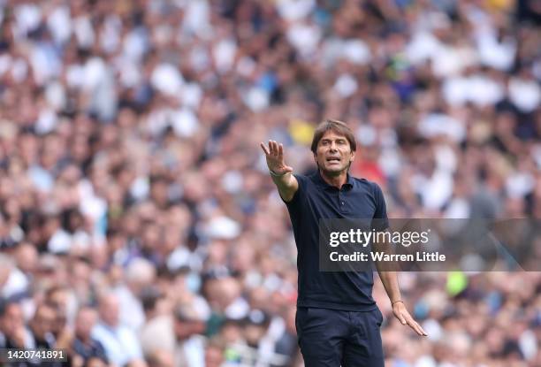 Antonio Conte, Head Coach of Tottenham Hotspur gestures from the side line during the Premier League match between Tottenham Hotspur and Fulham FC at...