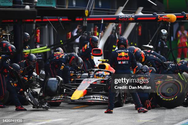 Sergio Perez of Mexico driving the Oracle Red Bull Racing RB18 makes a pitstop during the F1 Grand Prix of The Netherlands at Circuit Zandvoort on...