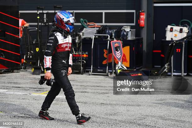 Valtteri Bottas of Finland and Alfa Romeo F1 walks in the Pitlane after stopping on track during the F1 Grand Prix of The Netherlands at Circuit...
