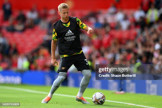 Oleksandr Zinchenko of Arsenal warms up prior to the Premier League match between Manchester United and Arsenal FC at Old Trafford on September 04,...