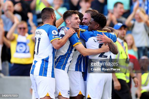 Alexis Mac Allister of Brighton & Hove Albion celebrates with team mates after scoring their sides fifth goal during the Premier League match between...