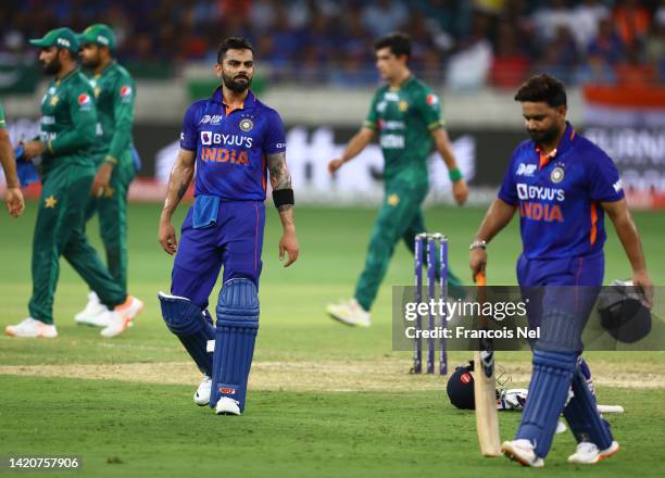 Virat Kohli of India looks on as Rishabh Pant of India leaves the field during the DP World Asia Cup match between India and Pakistan on September...