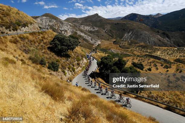 General view of Remco Evenepoel of Belgium and Team Quick-Step - Alpha Vinyl - Red Leader Jersey, Primoz Roglic of Slovenia and Team Jumbo - Visma...