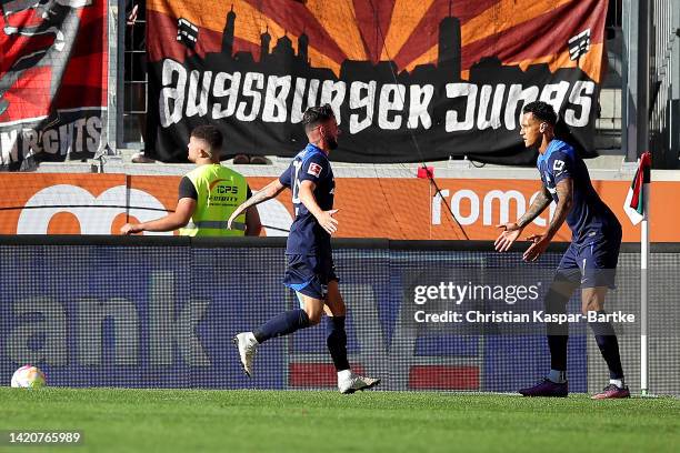 Marco Richter of Hertha Berlin celebrates with team mate Davie Selke after scoring their sides second goal during the Bundesliga match between FC...