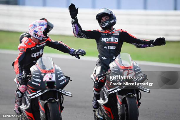 Maverick Vinales of Spain and Aprilia Racing celebrates with Aleix Espargaro of Spain and Aprilia Racing at the end of the MotoGP race during the...