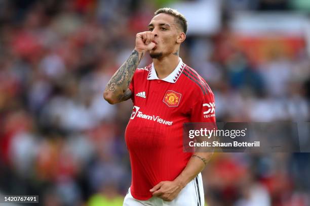 Antony of Manchester United celebrates after scoring their sides first goal during the Premier League match between Manchester United and Arsenal FC...