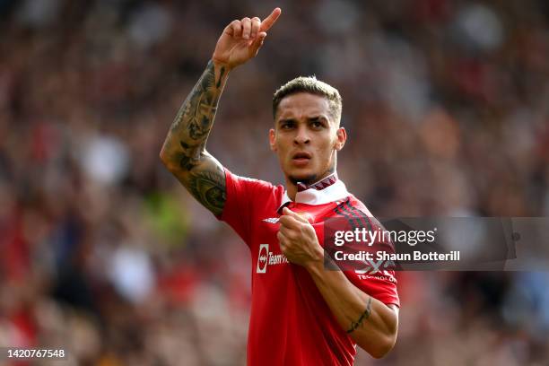 Antony of Manchester United celebrates after scoring their sides first goal during the Premier League match between Manchester United and Arsenal FC...