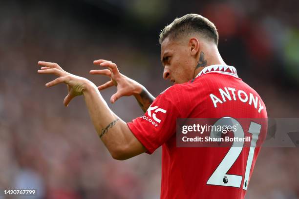 Antony of Manchester United celebrates after scoring their sides first goal during the Premier League match between Manchester United and Arsenal FC...