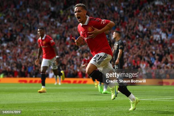 Antony of Manchester United celebrates after scoring their sides first goal during the Premier League match between Manchester United and Arsenal FC...