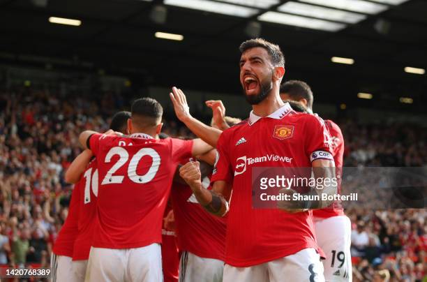 Bruno Fernandes of Manchester United celebrates after Antony of Manchester United scores their sides first goal during the Premier League match...