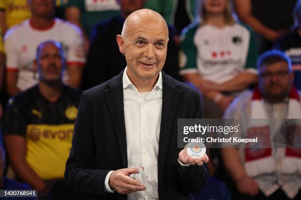 Bernd Neuendorf, DFB president presents the drawing match Eintracht Braunschweig and VfL Wolfsburg during the DFB Cup Second Round Draw at Deutsches...