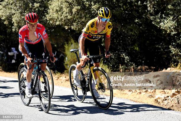 Remco Evenepoel of Belgium and Team Quick-Step - Alpha Vinyl - Red Leader Jersey and Primoz Roglic of Slovenia and Team Jumbo - Visma compete during...