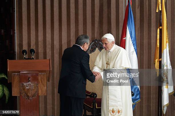 Pope Benedict XVI and Cuban President Raul Castro are seen during a farewell ceremony as the Pope leaves Cuba after a three day visit on March 28,...