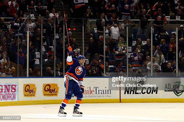 Marty Reasoner of the New York Islanders celebrates after he scored a goal in the first period against the Pittsburgh Penguins at Nassau Veterans...